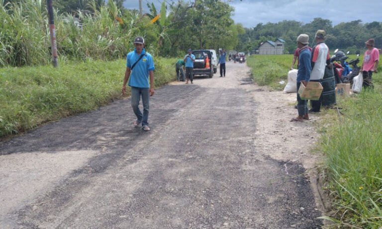 Jalan Kesugihan Pulung Ditambal