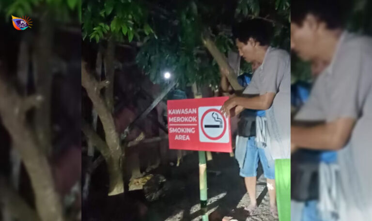 Warga sedang memasang tanda bebas rokok diberbagai titik. (Gambar : Kiriman Ali)